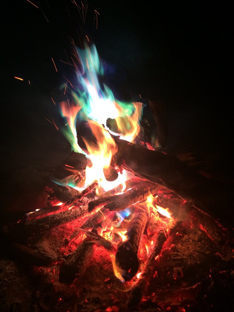 A campfire in the outdoors